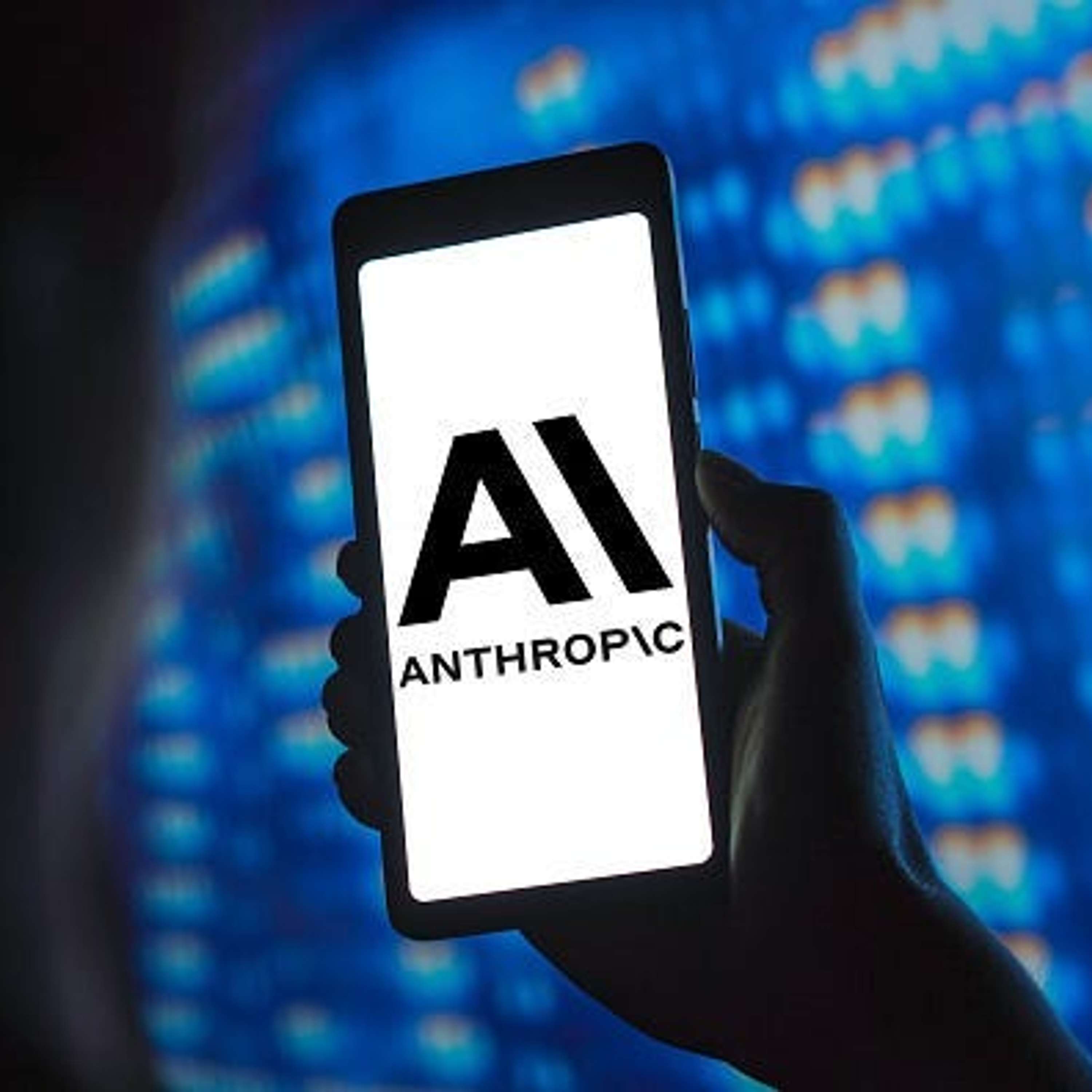 Anthropic Launches Claude App, Microsoft's $2.2B Expansion Pledge, Musk Axes Supercharger Team, Apple's iPhone Clock Glitch, and more...