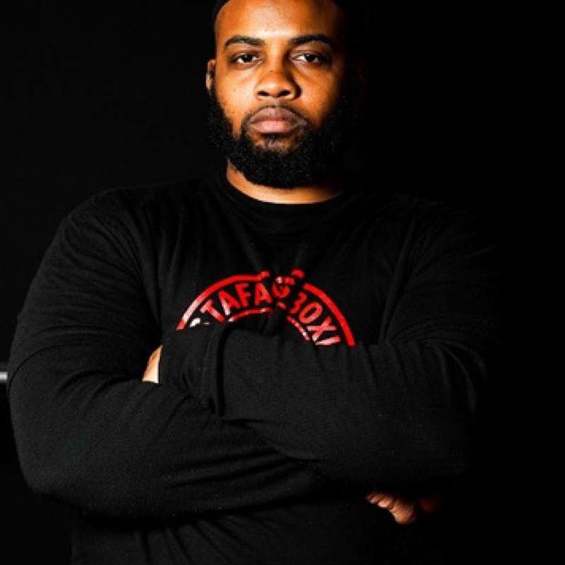 Coach Mustafa (Shamel C. Meekins)
