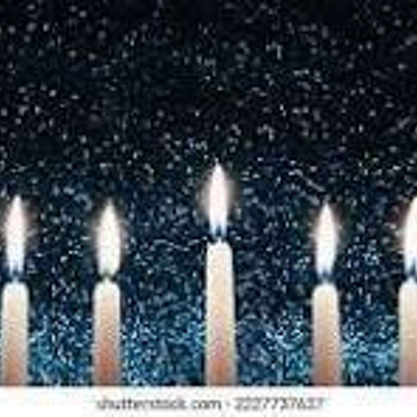 Chanukah Candle on a dark train
