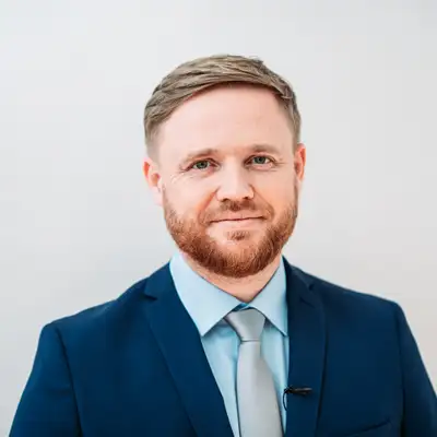 Максим Курников